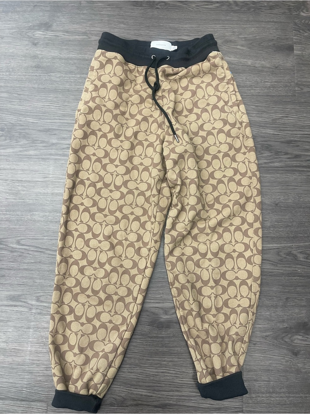 Coach Signature Logo Track Joggers in Tan and Black